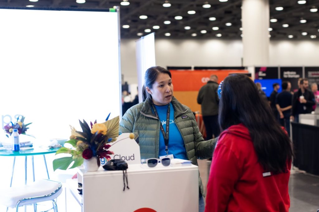 Elevate Your Brand Presence at Sessions: AI with a Captivating Exhibit Table!